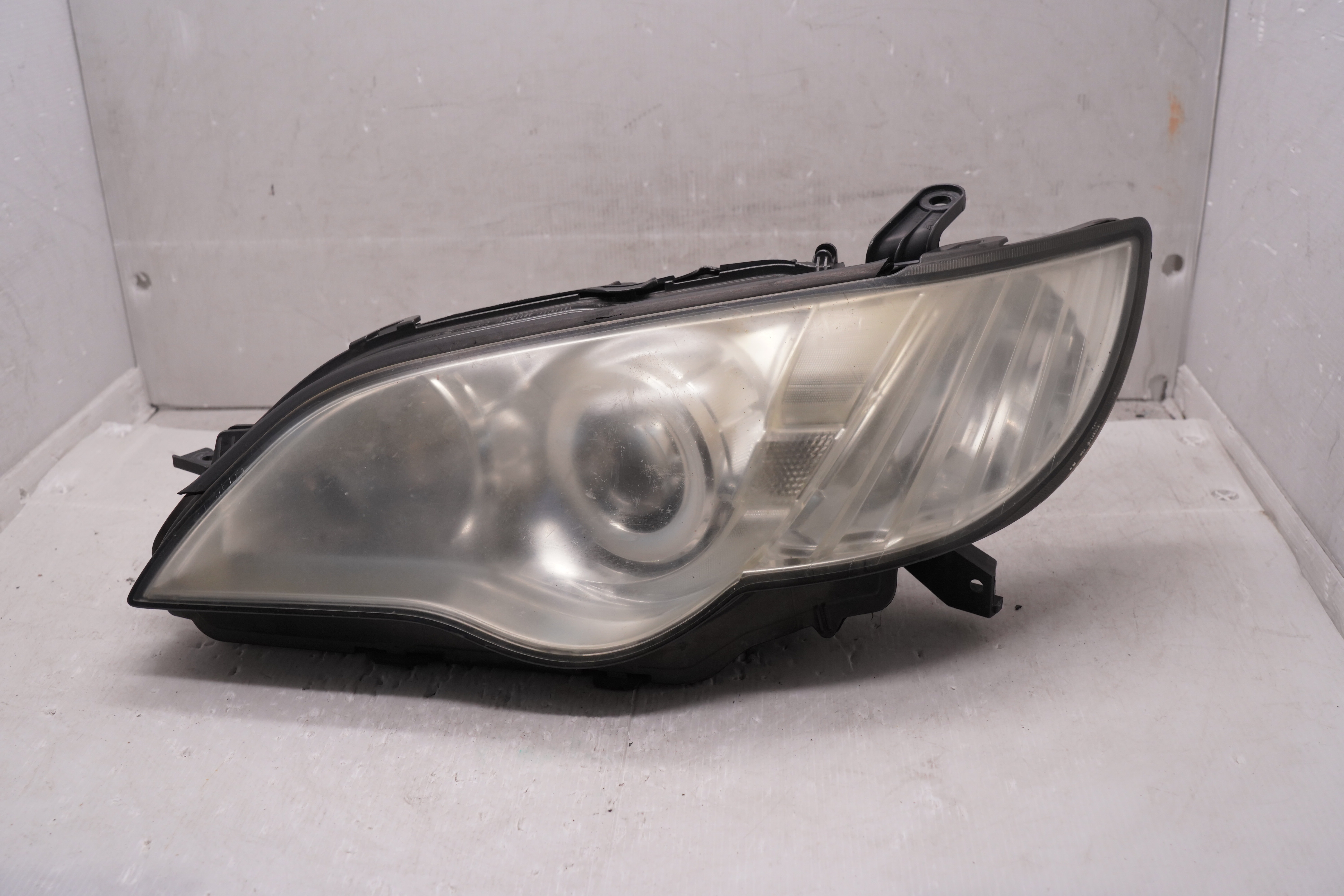 SUBARU LIBERTY OUTBACK LEGACY 2006-2009 HALOGEN L.H.S HEADLIGHT GENUINE